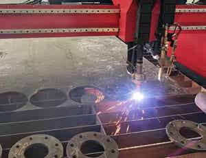 CNC cutter working – sparks flying, metal plate cutting