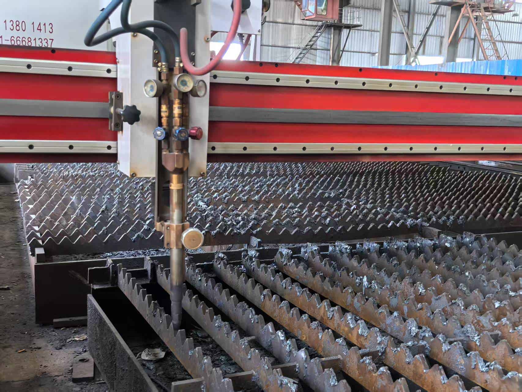 CNC cutting machine head – factory workshop setting