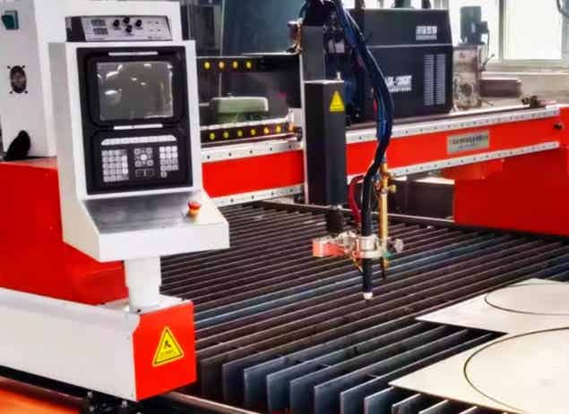 CNC flame cutting machine with control panel and cutting head